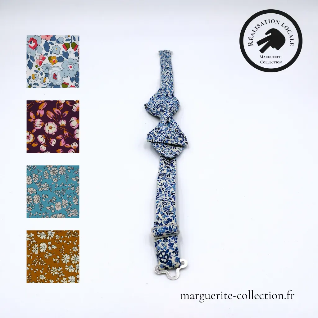 Marguerite-Collection_Noeud_papillon_homme_Variation Marguerite Collection Noeud papillon homme Variation - Élevez votre style avec notre Nœud Papillon Homme en Liberty, une pièce artisanale unique, confectionnée avec amour en France. Incarnez l'élégance à la française lors des occasions spéciales avec ce bijou asymétrique ajustable, disponible dans une palette de couleurs raffinées. - 35,00 €