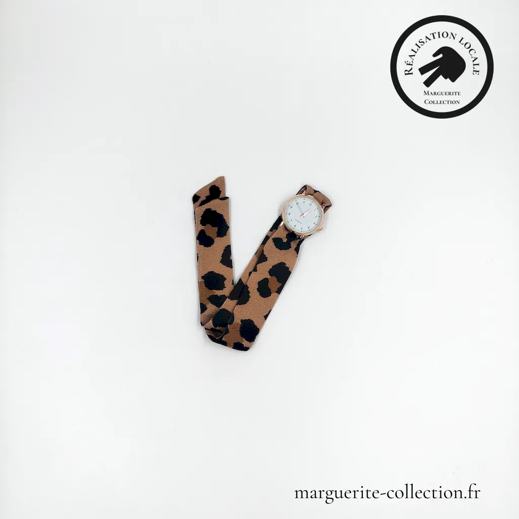 Marguerite-Collection_Montre_Dorée_Mini_Léopard_WEBP Marguerite Collection Montre Doree Mini Leopard WEBP - Montre à nouer "L'élégante" pour femmes. Avec un bracelet en tissu viscose de qualité. Plusieurs choix possibles de bracelets. Plusieurs types de cadrans proposés: Maxi dorée, Maxi argentée et Mini dorée. - 28,00 €