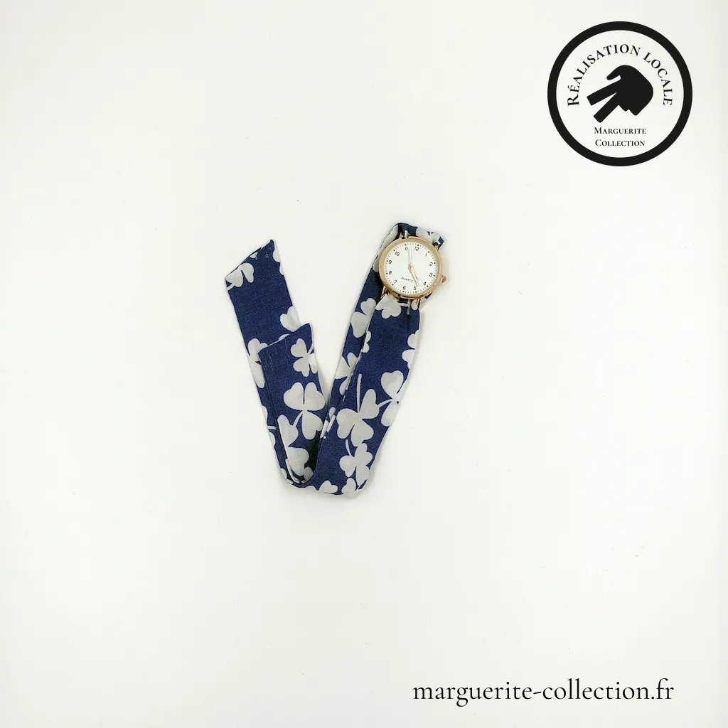 Marguerite-Collection_Montre_Dorée_Mini_Trèfles_WEBP Marguerite Collection Montre Doree Mini Trefles WEBP - Montre à nouer "L'élégante" pour femmes. Avec un bracelet en tissu viscose de qualité. Plusieurs choix possibles de bracelets. Plusieurs types de cadrans proposés: Maxi dorée, Maxi argentée et Mini dorée. - 28,00 €