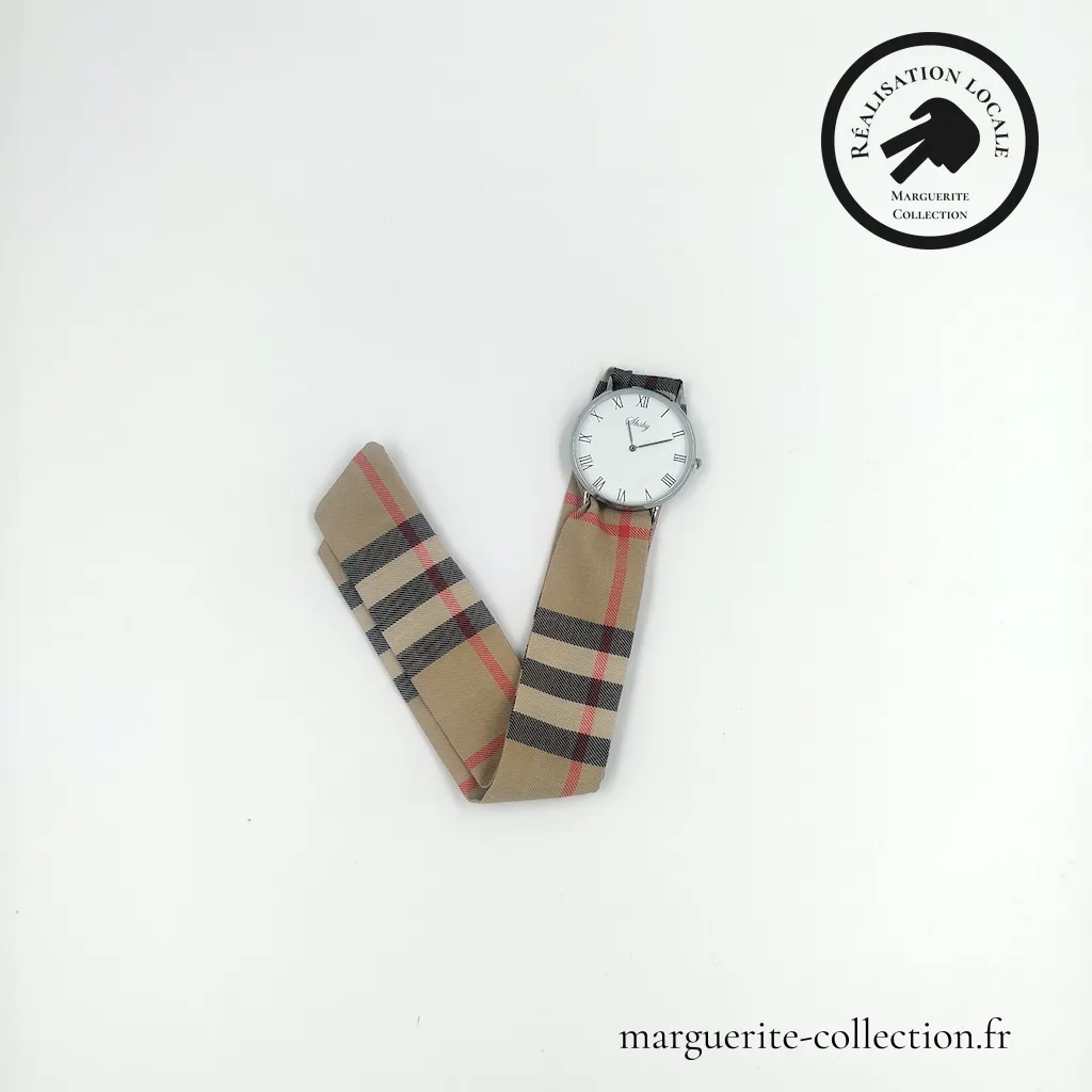 Marguerite-Collection_Montre_Argent_Maxi_L'élégante_Burberry Beige_WEBP Marguerite Collection Montre Argent Maxi Lelegante Burberry Beige WEBP - Montre à nouer "L'élégante" pour femmes. Avec un bracelet en tissu viscose de qualité. Plusieurs choix possibles de bracelets. Plusieurs types de cadrans proposés: Maxi dorée, Maxi argentée et Mini dorée. - 28,00 €