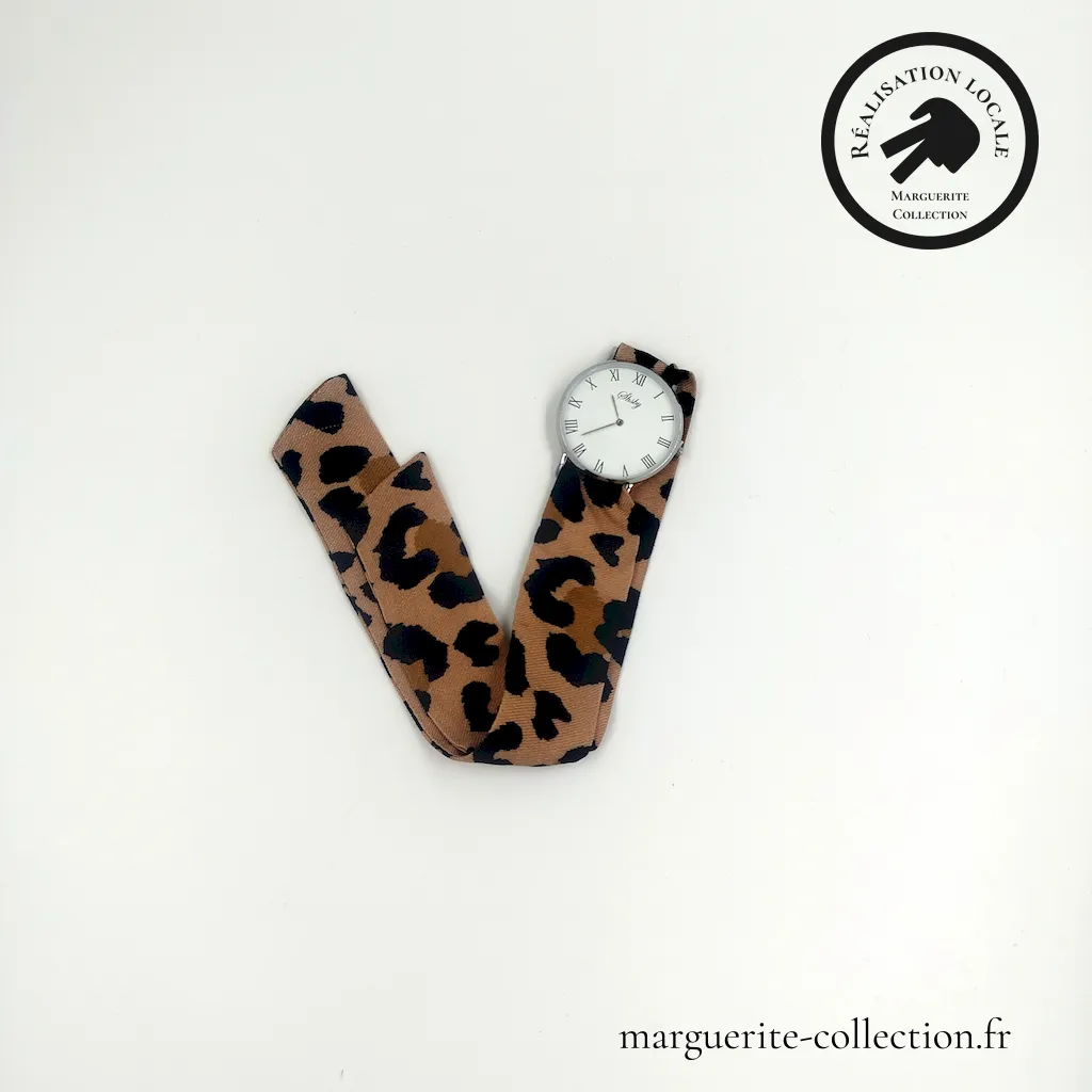 Marguerite-Collection_Montre_Argent_Maxi_L'élégante_Léopard Marronl_WEBP Marguerite Collection Montre Argent Maxi Lelegante Leopard Marronl WEBP - Montre à nouer "L'élégante" pour femmes. Avec un bracelet en tissu viscose de qualité. Plusieurs choix possibles de bracelets. Plusieurs types de cadrans proposés: Maxi dorée, Maxi argentée et Mini dorée. - 28,00 €