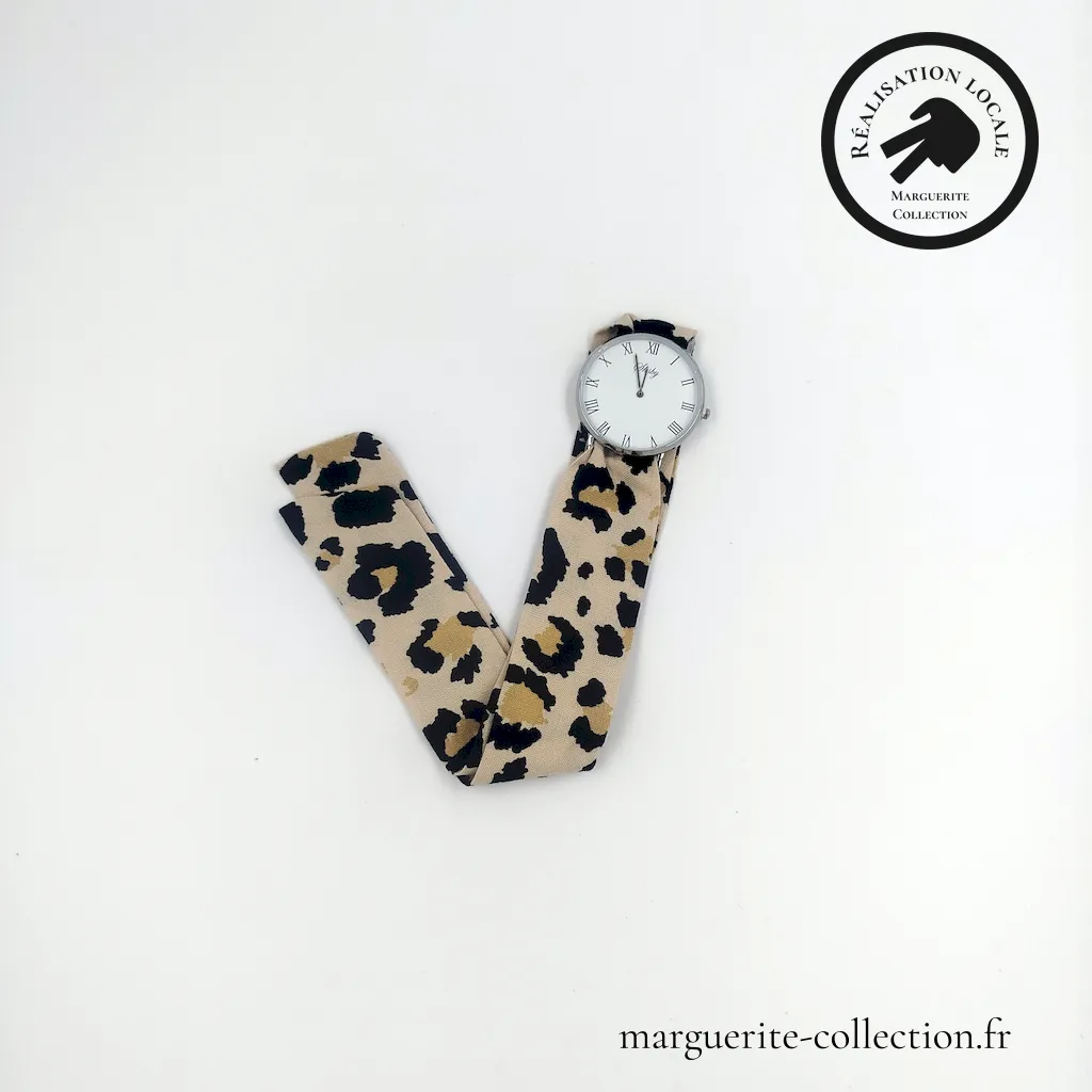 Marguerite-Collection_Montre_Argent_Maxi_L'élégante_Léopard_WEBP Marguerite - Montre à nouer "L'élégante" pour femmes. Avec un bracelet en tissu viscose de qualité. Plusieurs choix possibles de bracelets. Plusieurs types de cadrans proposés: Maxi dorée, Maxi argentée et Mini dorée. - 28,00 €
