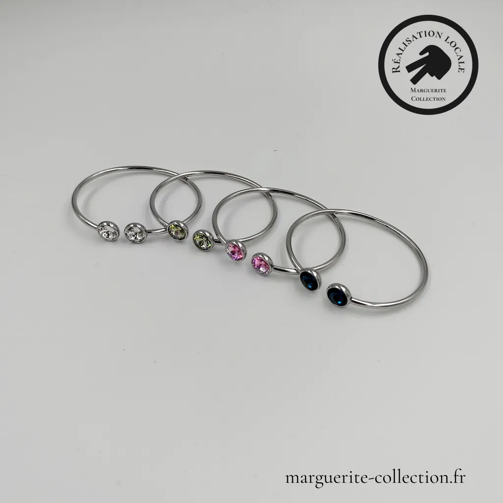 Marguerite-Collection_Bracelet Cabochon_Argent_WEBP Marguerite Collection Bracelet Cabochon Argent WEBP - Bracelet Aurore - Manchette chic en acier inoxydable, ornée de cristaux K9 ultra-brillants (8mm) disponibles en plusieurs teintes délicates. Réglable, lumineux et raffiné, il sublime le poignet en toute occasion. Disponible en finition dorée ou argentée. - 14,00 €